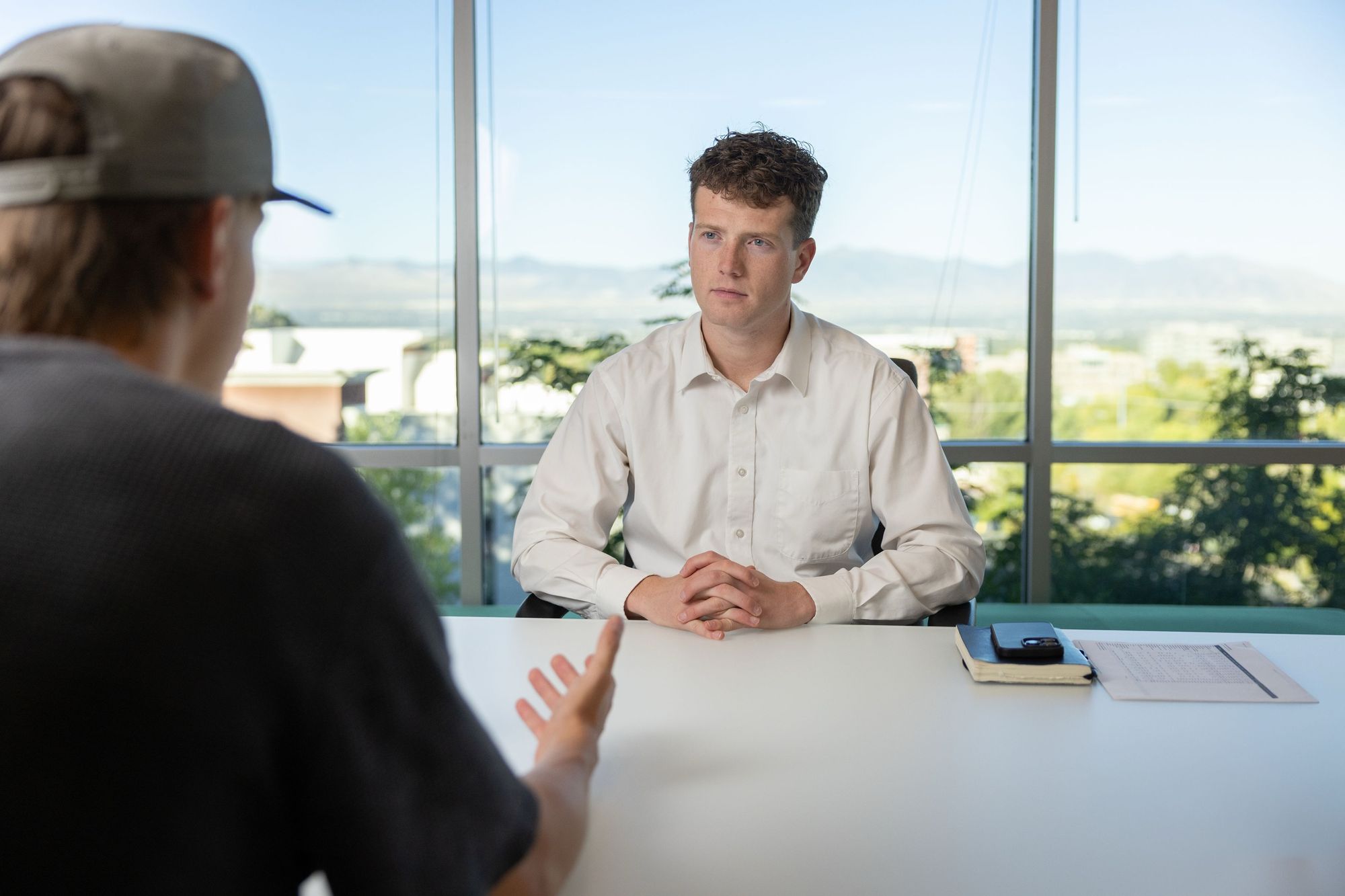 Matthew in a planning meeting with a business owner